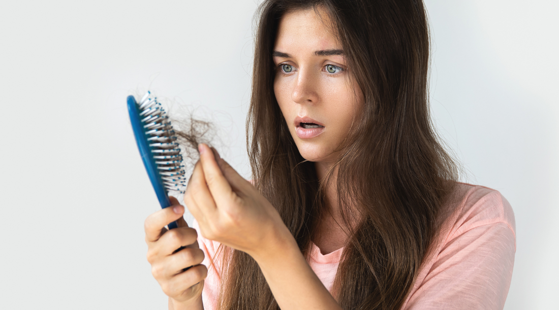 woman suffers from hair loss